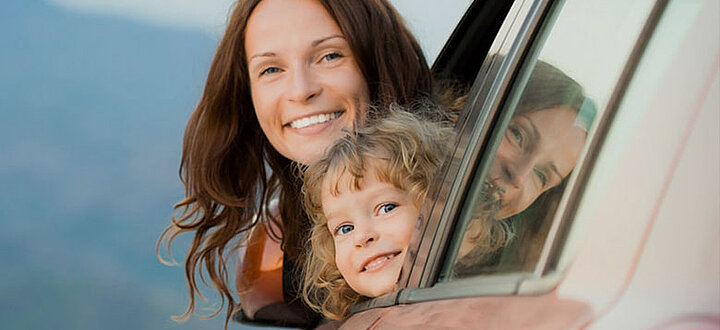 Mother and daughter in car