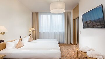 [Translate to český:] Best Western Ahorn Hotel Oberwiesenthal Suite  Schlafbereich