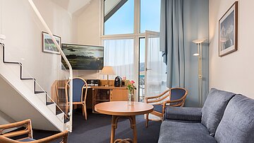 [Translate to český:] Best Western Ahorn Hotel Oberwiesenthal Maisonette Studio Wohnbereich
