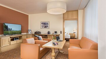 [Translate to český:] Best Western Ahorn Hotel Oberwiesenthal Suite Wohnbereich